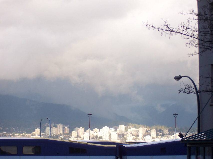 Clouds, mountains, North Vancouver and train