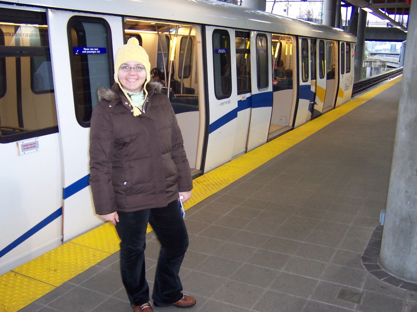 Verica in front of train (city train ? )